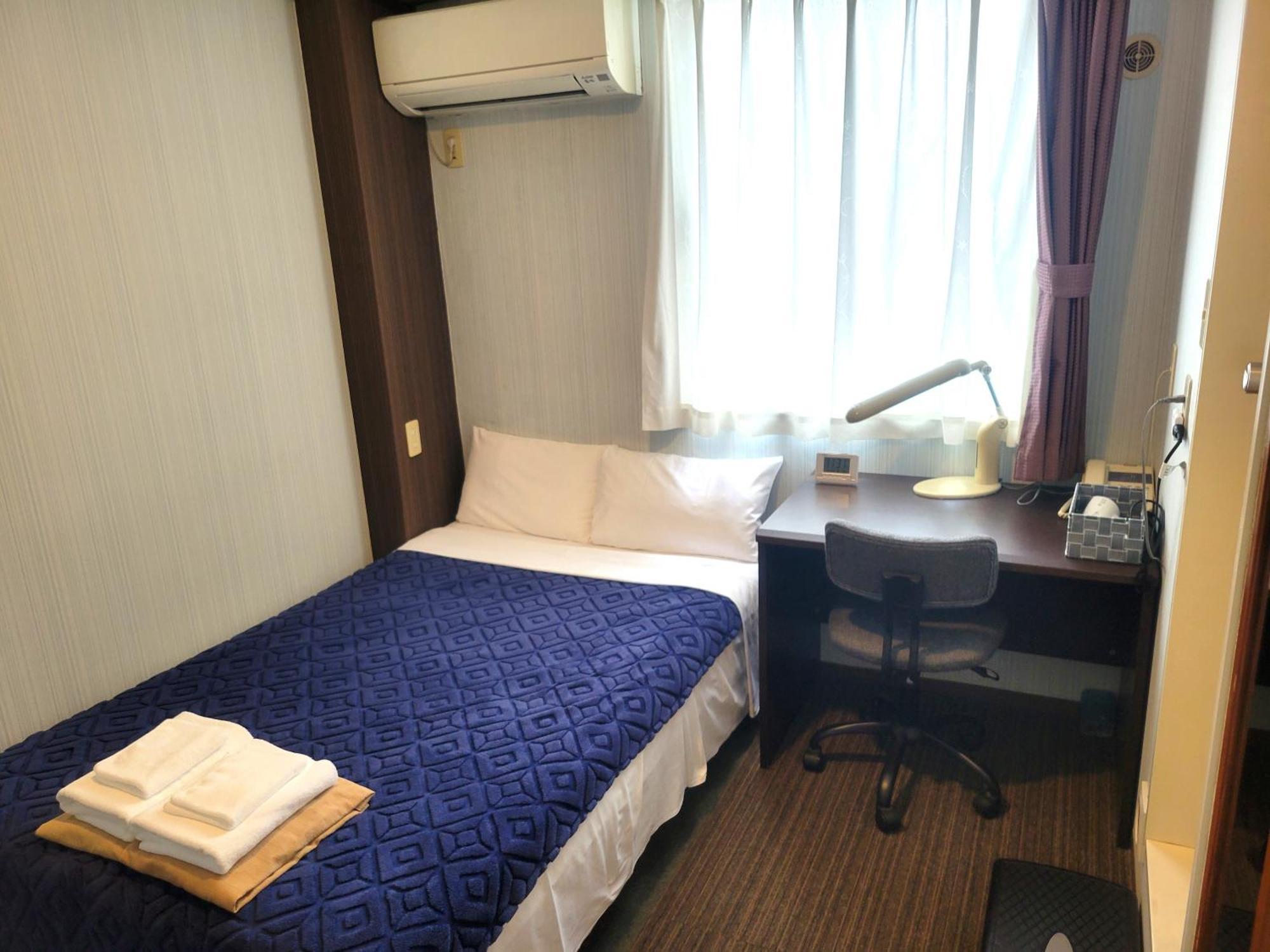 Saga City Hotel Habitación foto